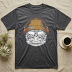 Leopard Gecko Headphones T-Shirt in Dark Heather — Engraved leopard gecko with spotted skin in a beanie and headphones, aviators reflecting a desert canyon.