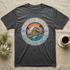 Dark grey t-shirt featuring a circular graphic of a VW bus and crab, "Beach Club" text.