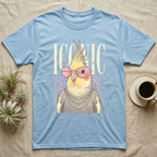Blue t-shirt featuring a cockatiel wearing sunglasses and pearls, with "ICONIC" text.
