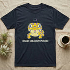 Dark t-shirt with cartoon gecko illustration and "BRAIN CELL NOT FOUND" text.