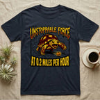 Red-Footed Tortoise Unstoppable Force T-Shirt in Navy — Metal-style furious tortoise charging a candy pumpkin, "Unstoppable Force At 0.2 Miles Per Hour."