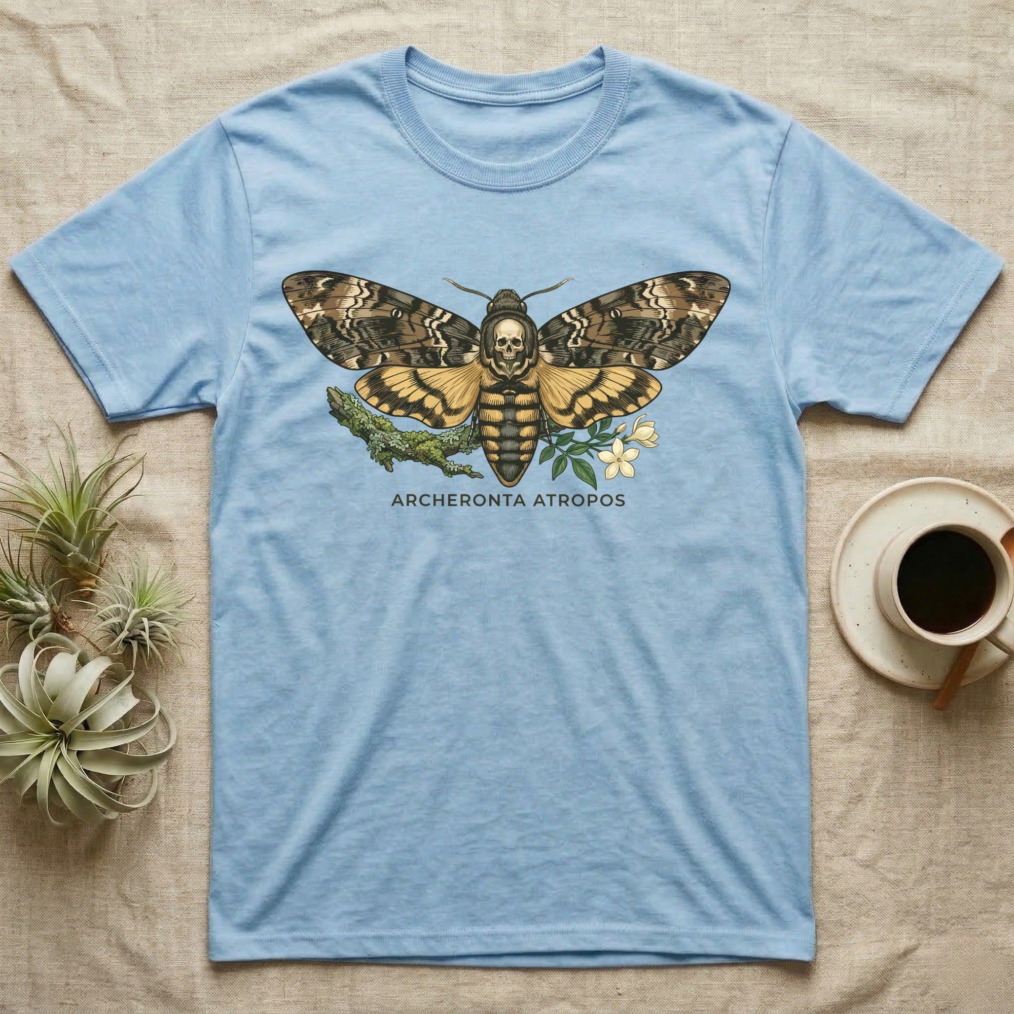 Light blue t-shirt featuring a death's-head hawkmoth illustration with text "Acherontia Atropos".