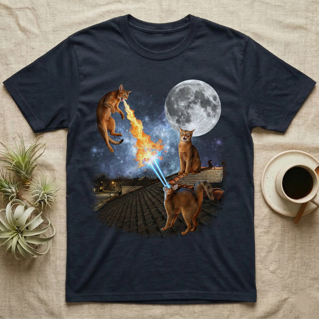 T-shirt featuring cats shooting lasers and fire at a full moon.