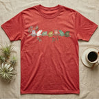White's Tree Frog Canopy Crew T-Shirt in Heather Red — Watercolor illustration of seven White's tree frogs in different colour phases on a eucalyptus branch, dark grey T-shirt design.