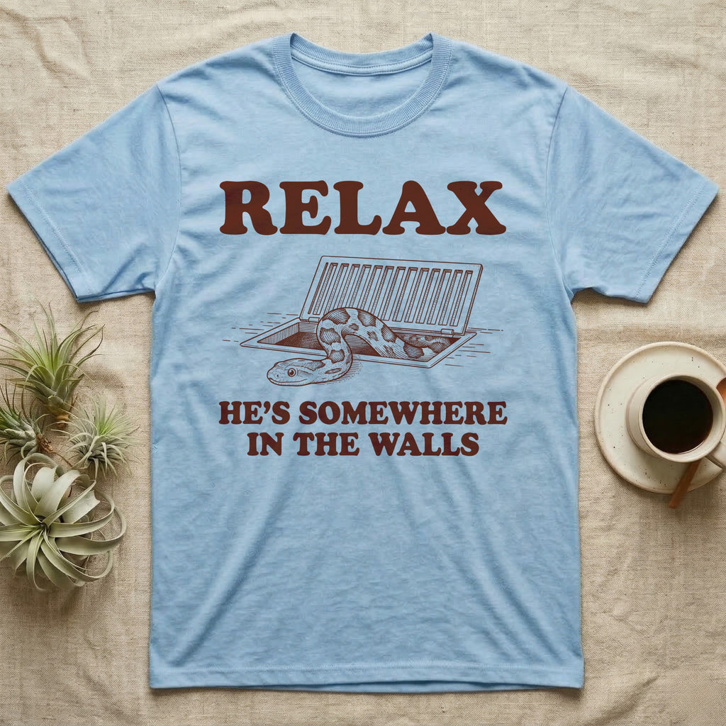 Corn Snake Walls T-Shirt in Light Blue — Engraved corn snake looking out of an open floor vent, with the words Relax, He's Somewhere in the Walls