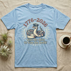 Ball Python 1776 T-Shirt in Light Blue — Vintage distressed badge of a ball python in a feeding strike over a food dish, cream and brick-red emblem reading Give Me Mice Or Give Me Death.