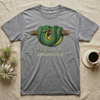 Green python (Morelia viridis) coiled on branch, text "Morelia viridis - Arboreal Specialist - Aru Locality".