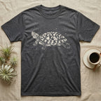 Red-Eared Slider Bleach T-Shirt in Dark Heather — Red-eared slider in side view basking with its neck stretched out, made of pale bleach spatter on black