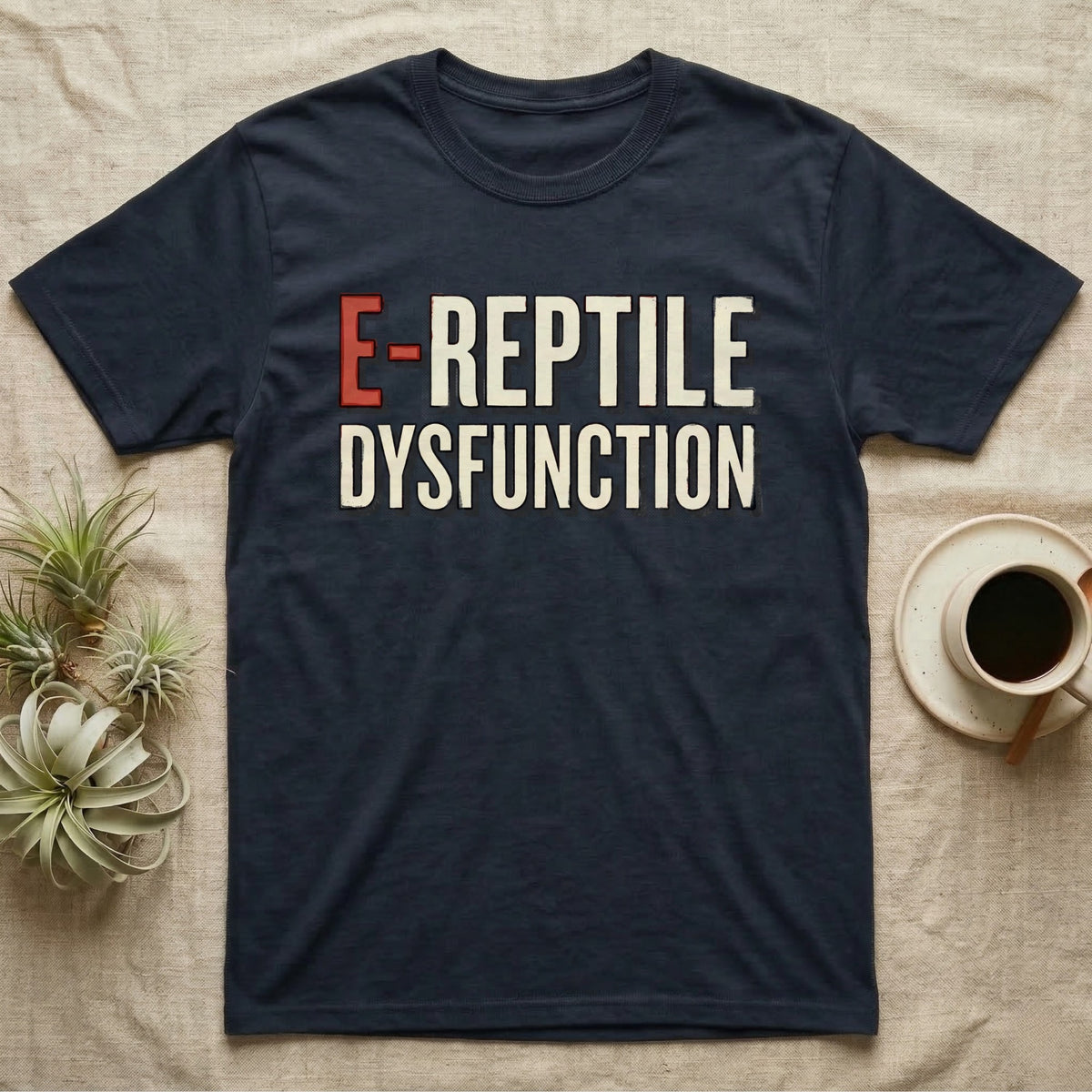 E-Reptile Dysfunction Gecko T-Shirt in Navy — Retro-pharmacy typographic wordmark reading "E-Reptile Dysfunction" in distressed cream and tomato-red lettering.