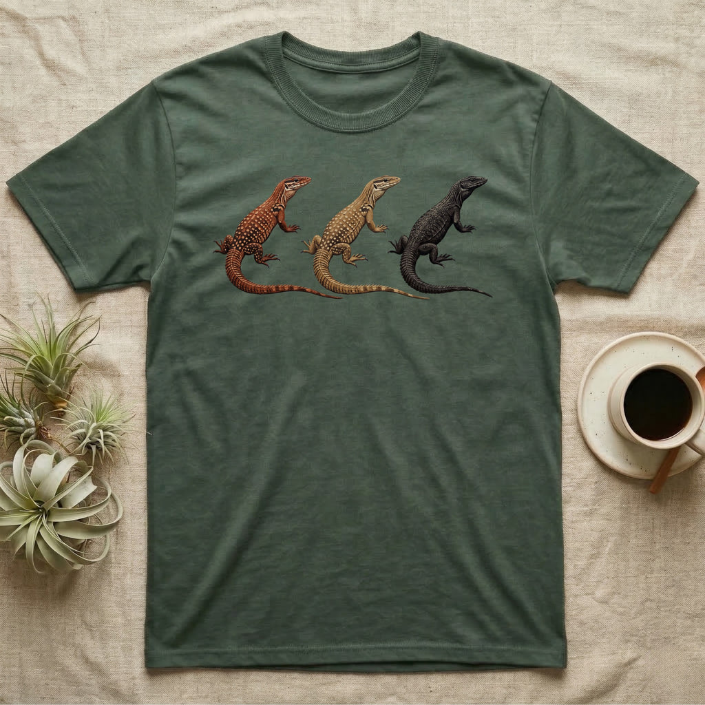 Ackie Monitor Triptych T-Shirt in Military Green — Three ackie monitors in a row, painted in thick impasto — red, yellow and dark island forms with pale ocelli.