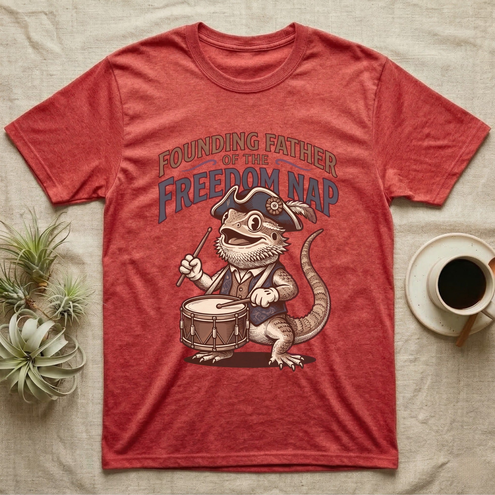 Bearded Dragon Drummer T-Shirt in Heather Red — Sepia woodcut bearded dragon as a Revolutionary drummer boy under ornate text Founding Father of the Freedom Nap.