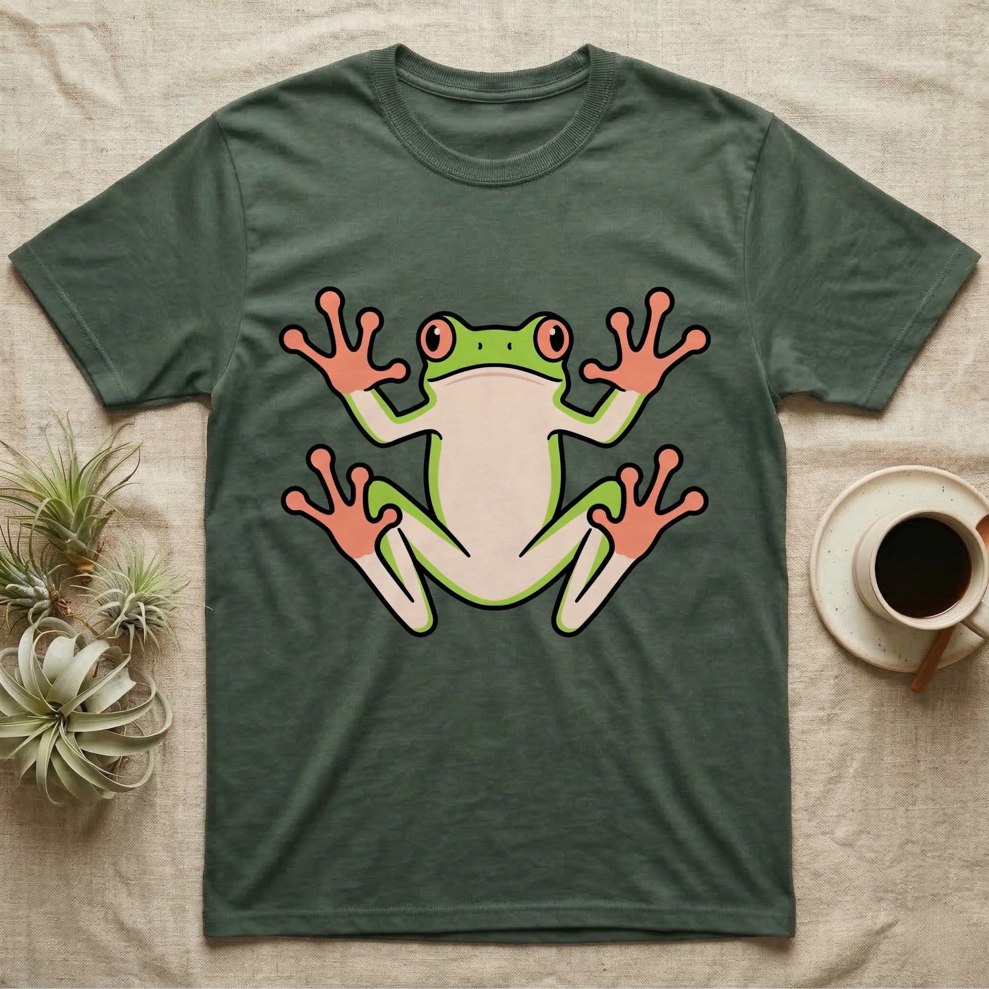 Tree Frog On Glass T-Shirt in Military Green — Vector-bold tree frog plastered against implied glass, suction feet splayed wide, small "Tree Frog On Glass." caption.