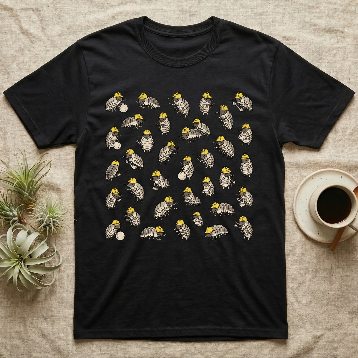 Isopod Cleanup Crew T-Shirt in Black — Flat all-over scatter of cheerful isopods in tiny hi-vis hard-hats as a bioactive cleanup crew on shift.