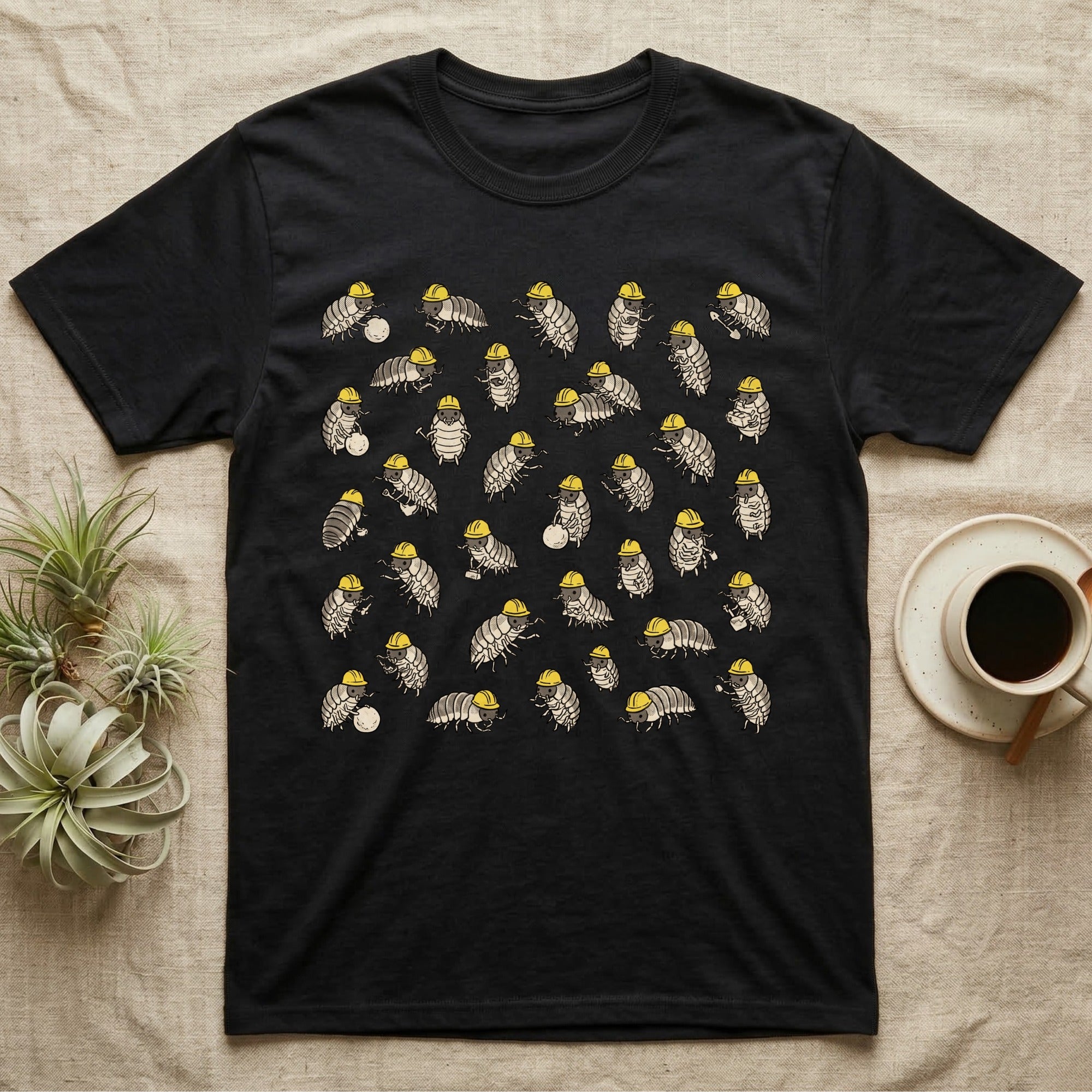 Isopod Cleanup Crew T-Shirt in Black — Flat all-over scatter of cheerful isopods in tiny hi-vis hard-hats as a bioactive cleanup crew on shift.