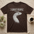 Ghost Corn Snake T-Shirt in Dark Chocolate — Gritty one-ink white print of a pale ghost corn snake head under the words I GHOST PEOPLE, it's genetic, on black