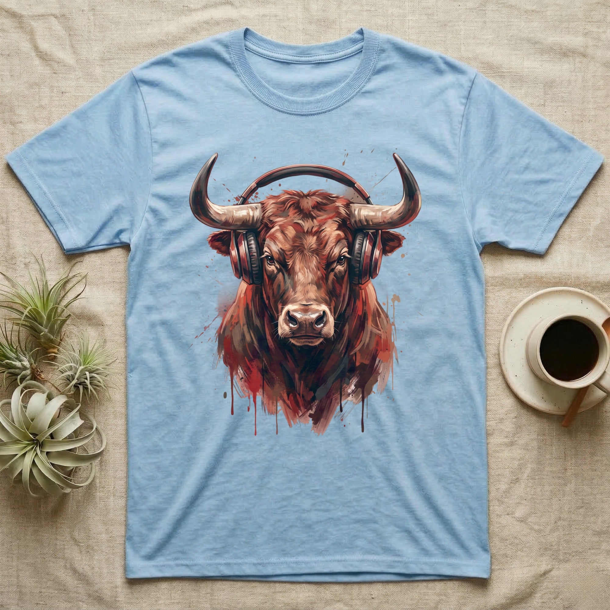 Light blue t-shirt featuring a bold, colorful bull wearing headphones.