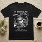 Bearded Dragon Skater T-Shirt in Black — Black-and-white bearded dragon in a 1776 snapback on a flag skateboard under text 250 Years of Lizard Supremacy.