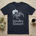 Jumping Spider Spooky Season T-Shirt in Navy — Minimal continuous-line jumping spider over a spiderweb pumpkin, text "Spooky Season" with a spider in the O.