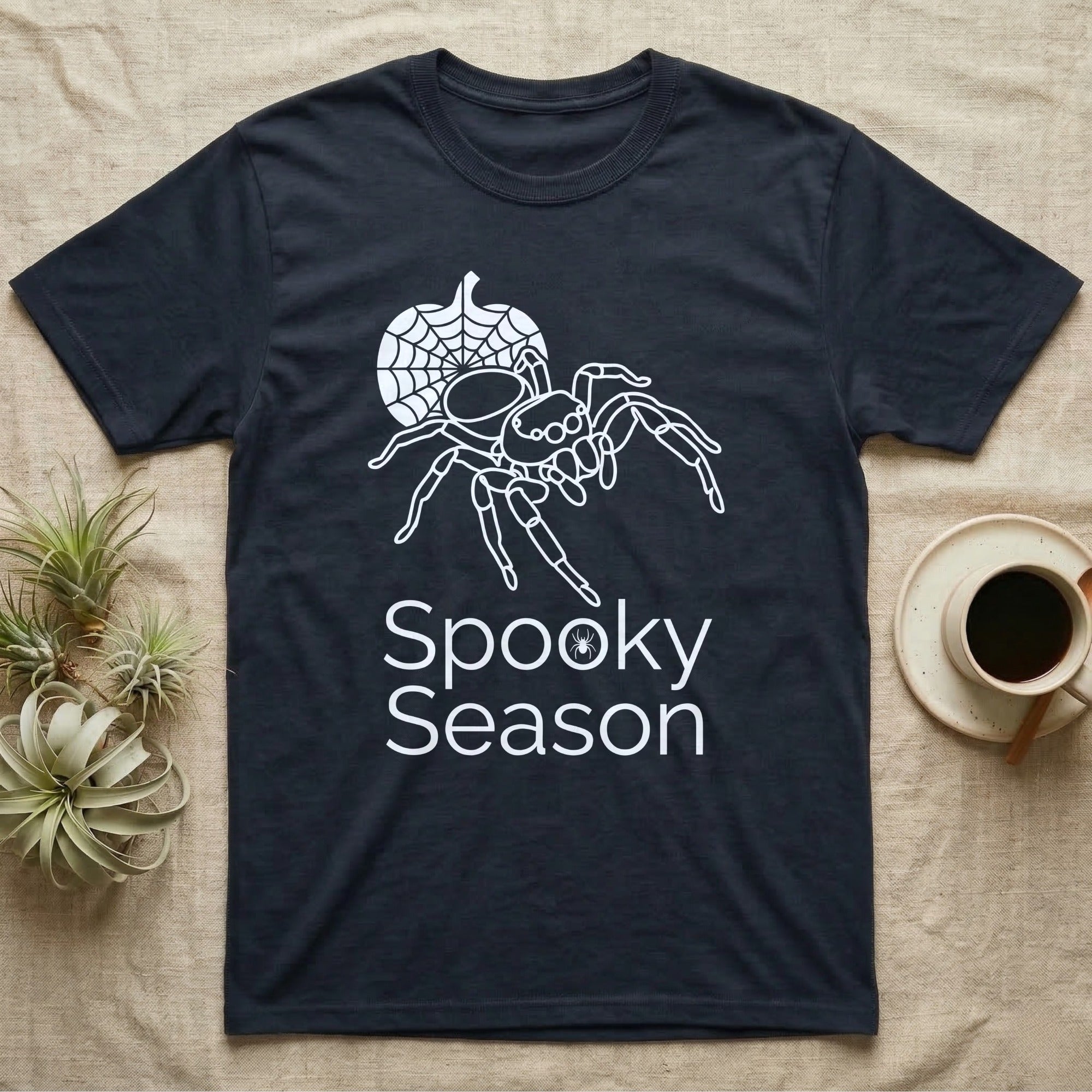 Jumping Spider Spooky Season T-Shirt in Navy — Minimal continuous-line jumping spider over a spiderweb pumpkin, text "Spooky Season" with a spider in the O.