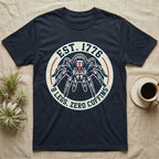 Tarantula Zero Coffins T-Shirt in Navy — Circular patch emblem of a tarantula in a top hat with arched text Est. 1776 and 8 Legs Zero Coffins.