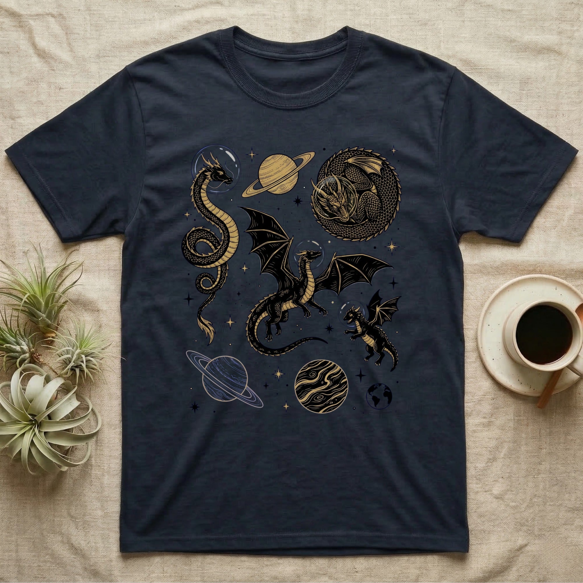 Dark t-shirt with celestial dragons and planets design.