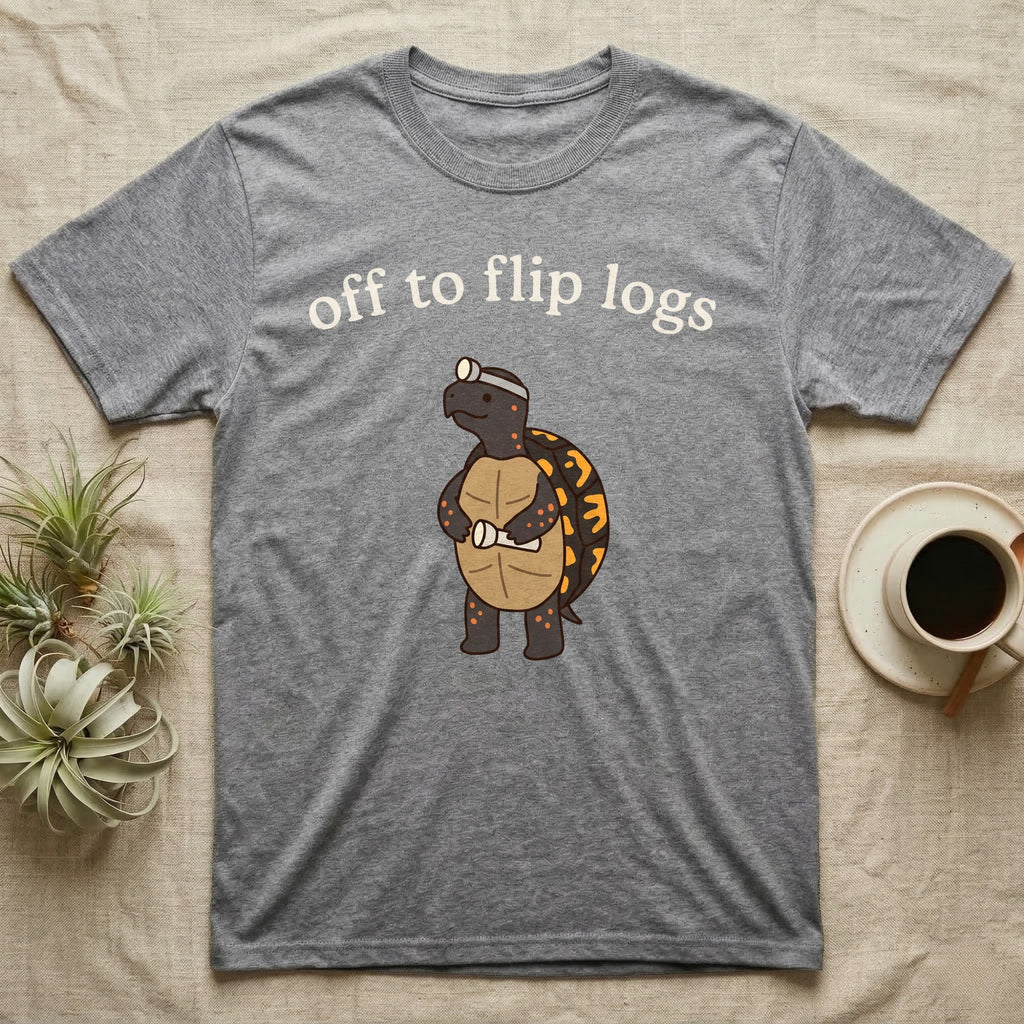 Box Turtle Herping T-Shirt in Sport Grey — Minimal doodle of an eastern box turtle standing upright in a headlamp holding a flashlight, under the words off to flip logs