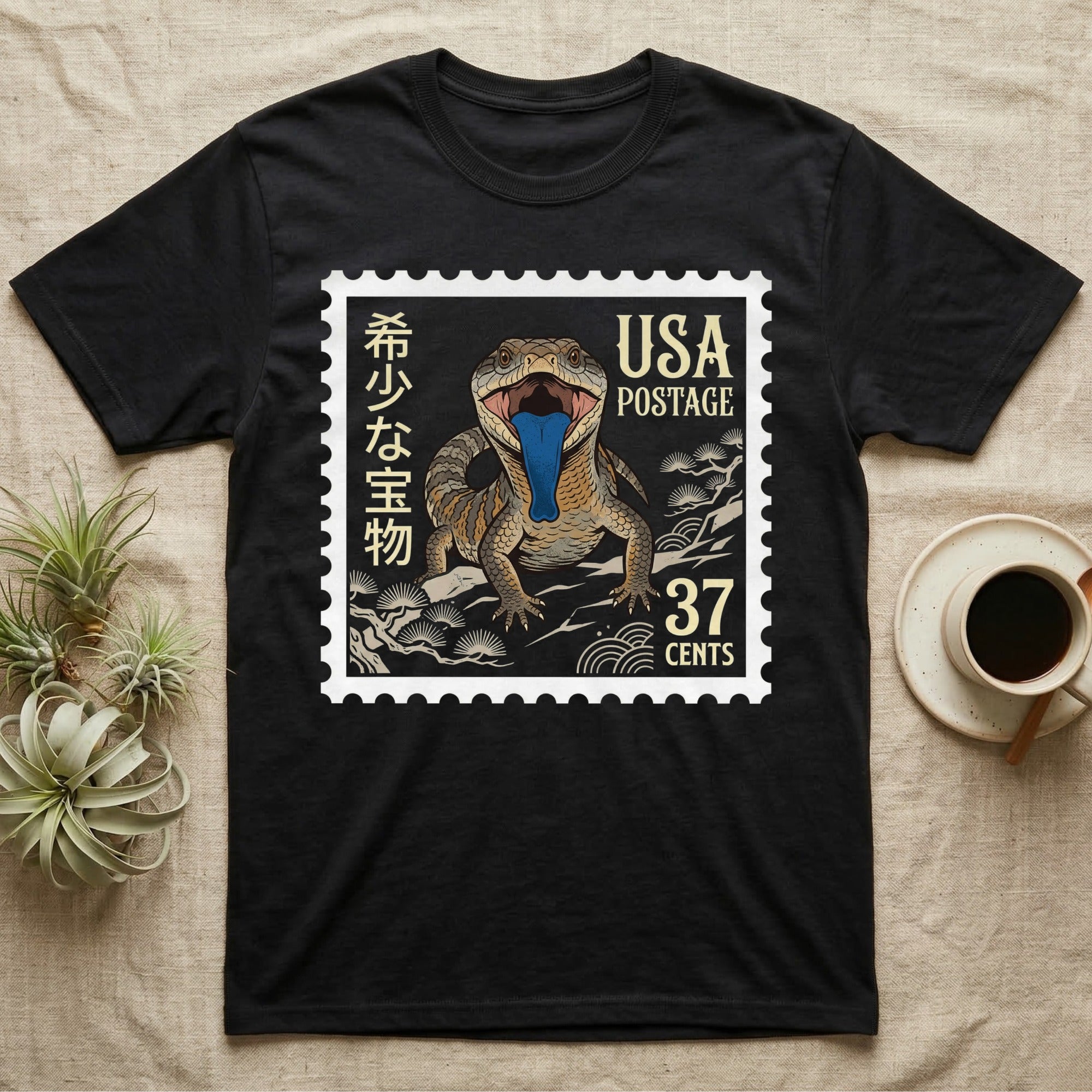 Black t-shirt featuring a postage stamp design with a lizard and "USA Postage 37".