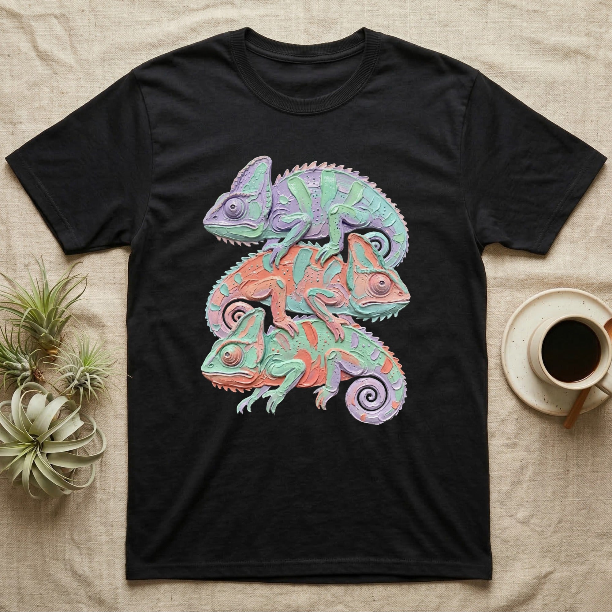 Black t-shirt with three stacked chameleons in pastel colors.
