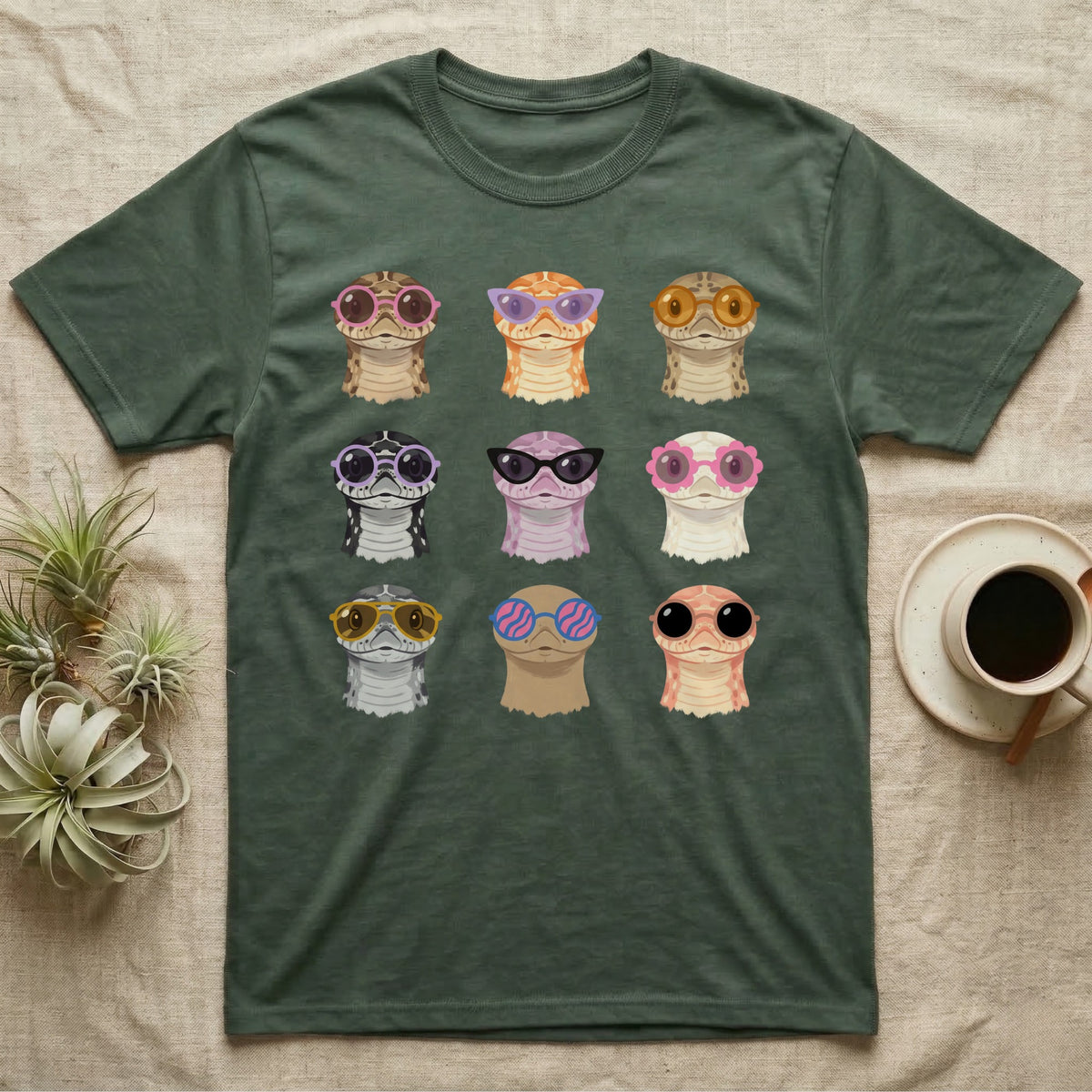 Hognose Morphs Sunglasses T-Shirt in Military Green — Gouache grid of nine western hognose snake morphs as frontal busts, each wearing different sunglasses