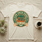Tortoise Slow-oween Parade T-Shirt in Natural — Distressed badge of a witch-hatted tortoise pulling a pumpkin wagon, "Slow-oween Parade, Division Last Place."