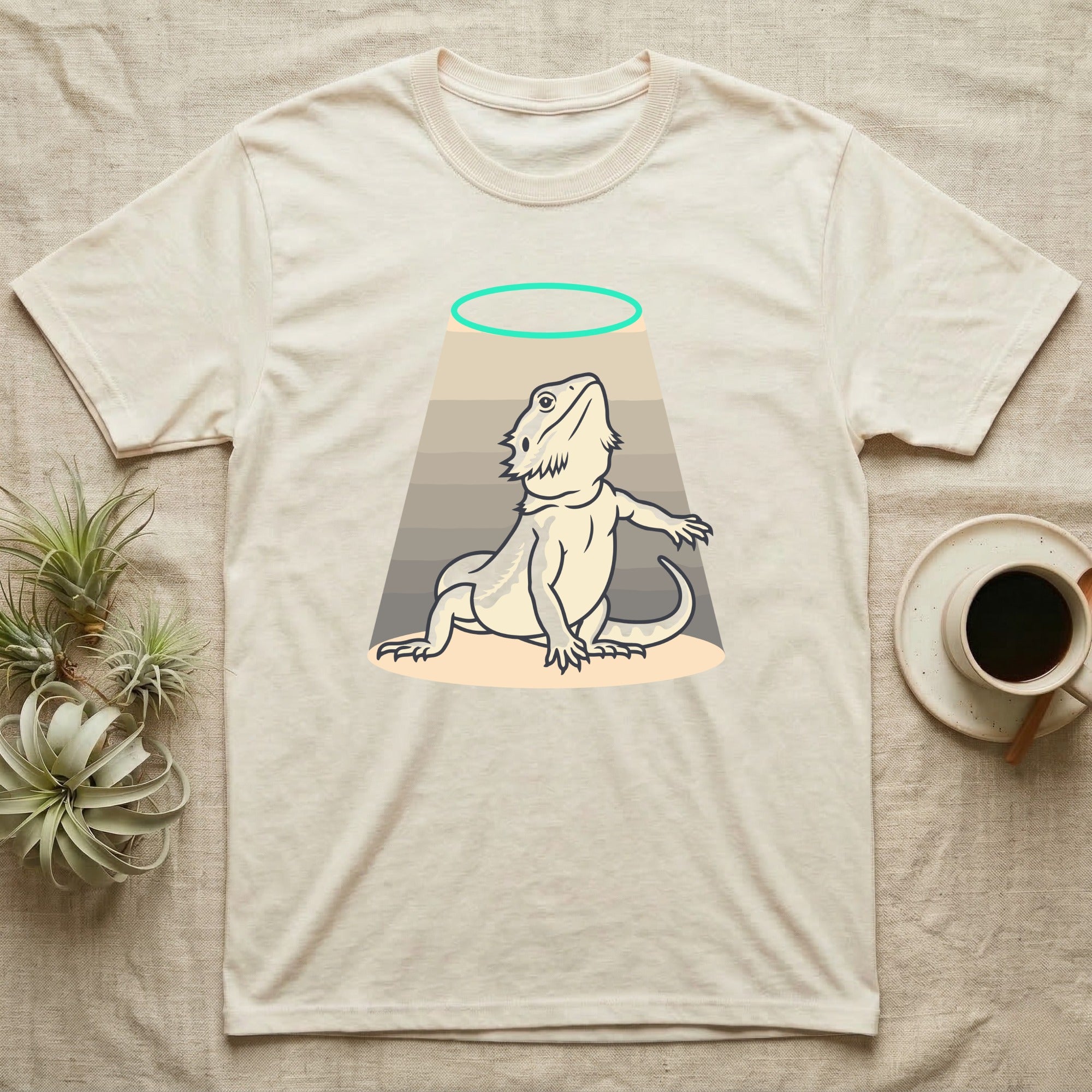 Bearded Dragon Diva T-Shirt in Natural — Bold vector illustration of a bearded dragon in a dramatic stage pose under a soft spotlight, chin lifted.