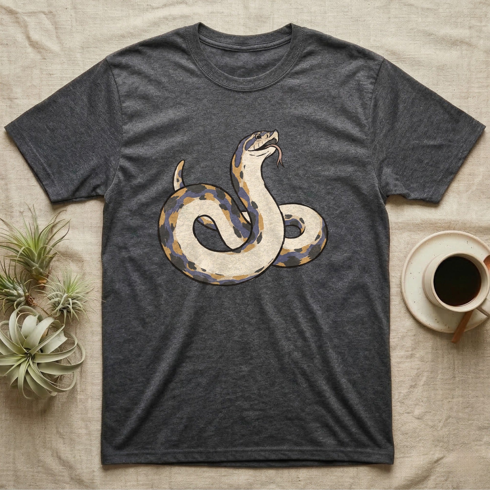 Hognose Play Dead T-Shirt in Dark Heather — Ukiyo-e woodblock illustration of a western hognose snake playing dead belly-up with a deadpan serif caption beneath.