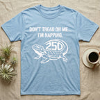Bearded Dragon Napping T-Shirt in Light Blue — White stencil bearded dragon resting with 250 cut into the tail under text Don't Tread On Me, I'm Napping.