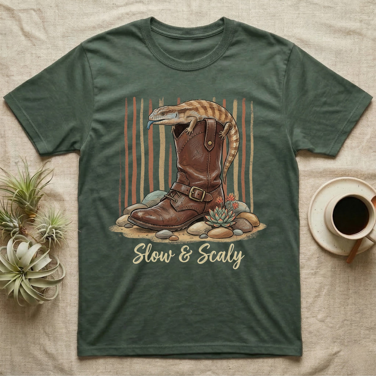 T-shirt with a lizard on a boot, text "Slow & Scaly".