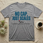 Rattlesnake No Cap T-Shirt in Sport Grey — Big distressed text No Cap Just Scales over a tiny snake in a red top hat with 250 Years of Free-Hiss below.