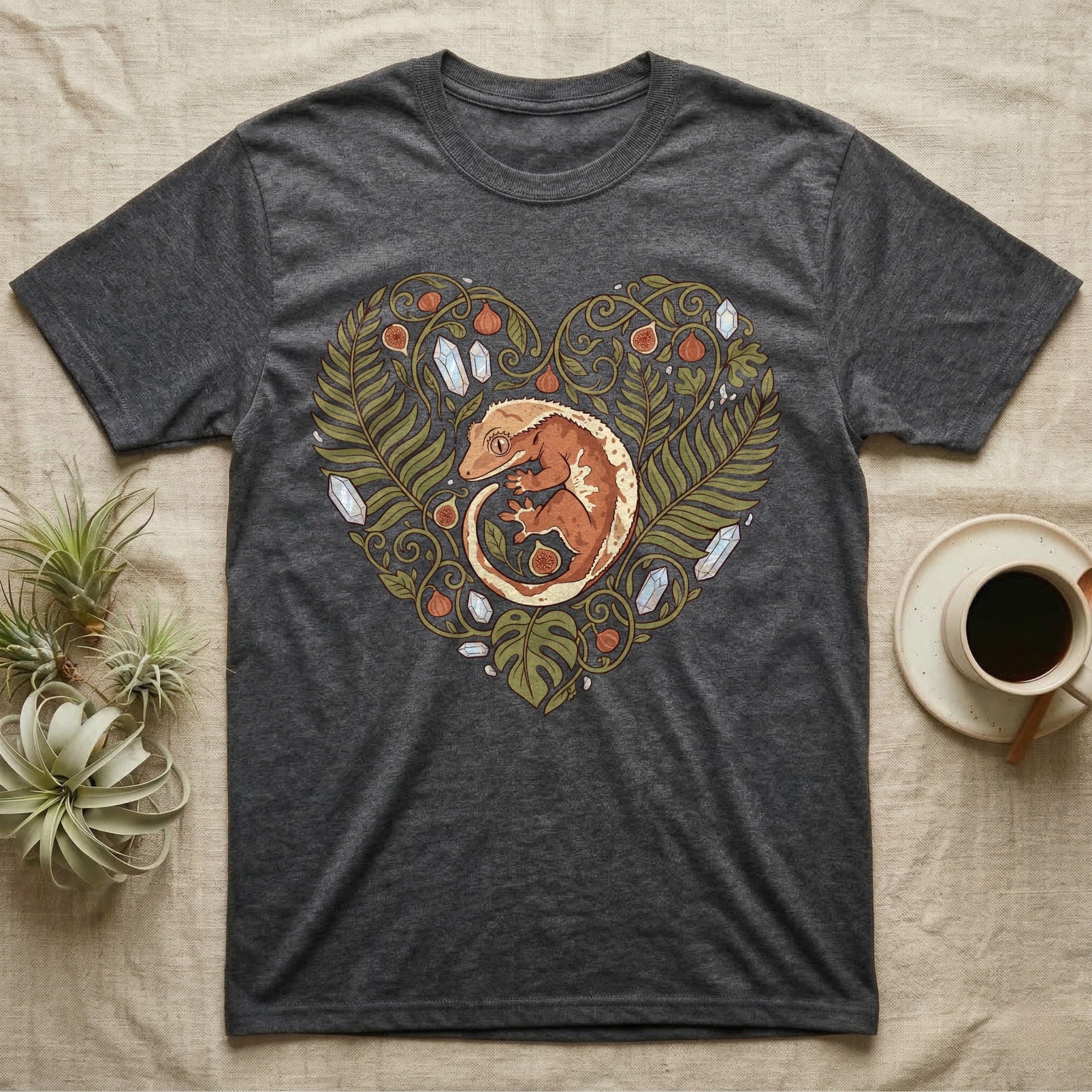 Dark gray t-shirt with a heart-shaped gecko and leaf design.
