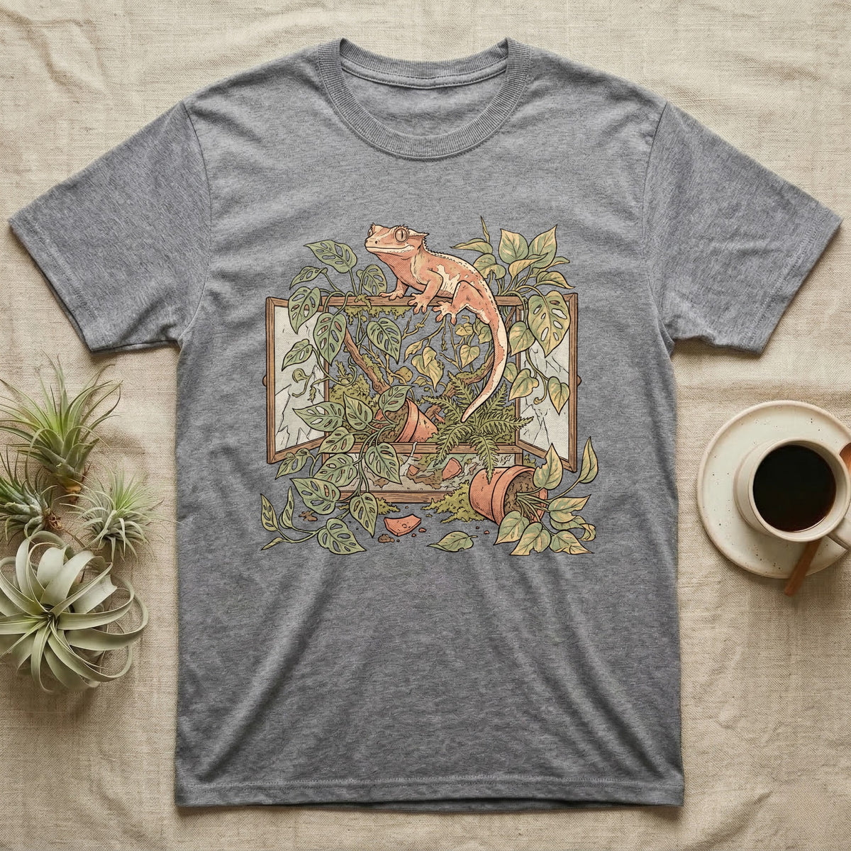 Bioactive Crested Gecko T-Shirt in Sport Grey — Botanical illustration of a smug crested gecko perched atop a lush overgrown planted vivarium spilling vines.