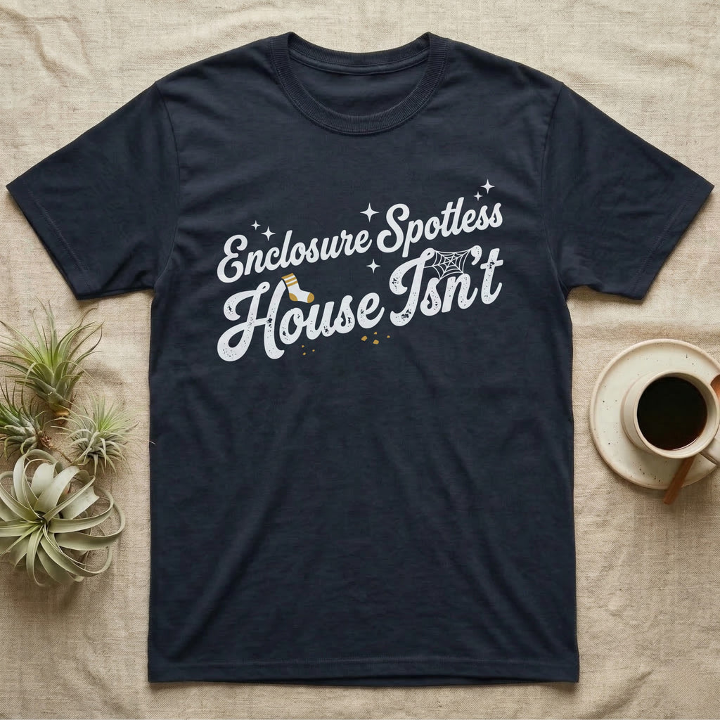 Terrarium Spotless House T-Shirt in Navy — Retro script reading Enclosure Spotless with sparkles above grubby lettering reading House Isn't with a sock, cobweb and crumbs