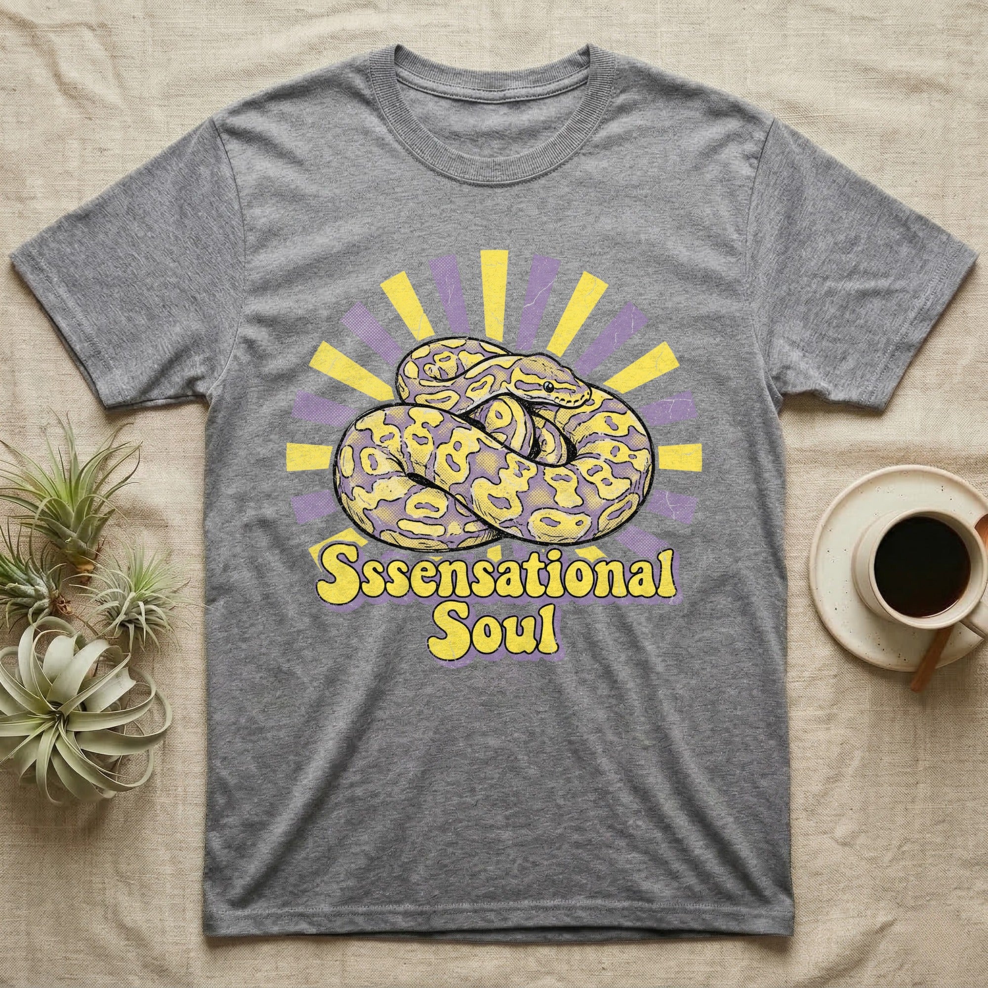 Grey t-shirt with yellow and purple snake and "Sssensational Soul" text.