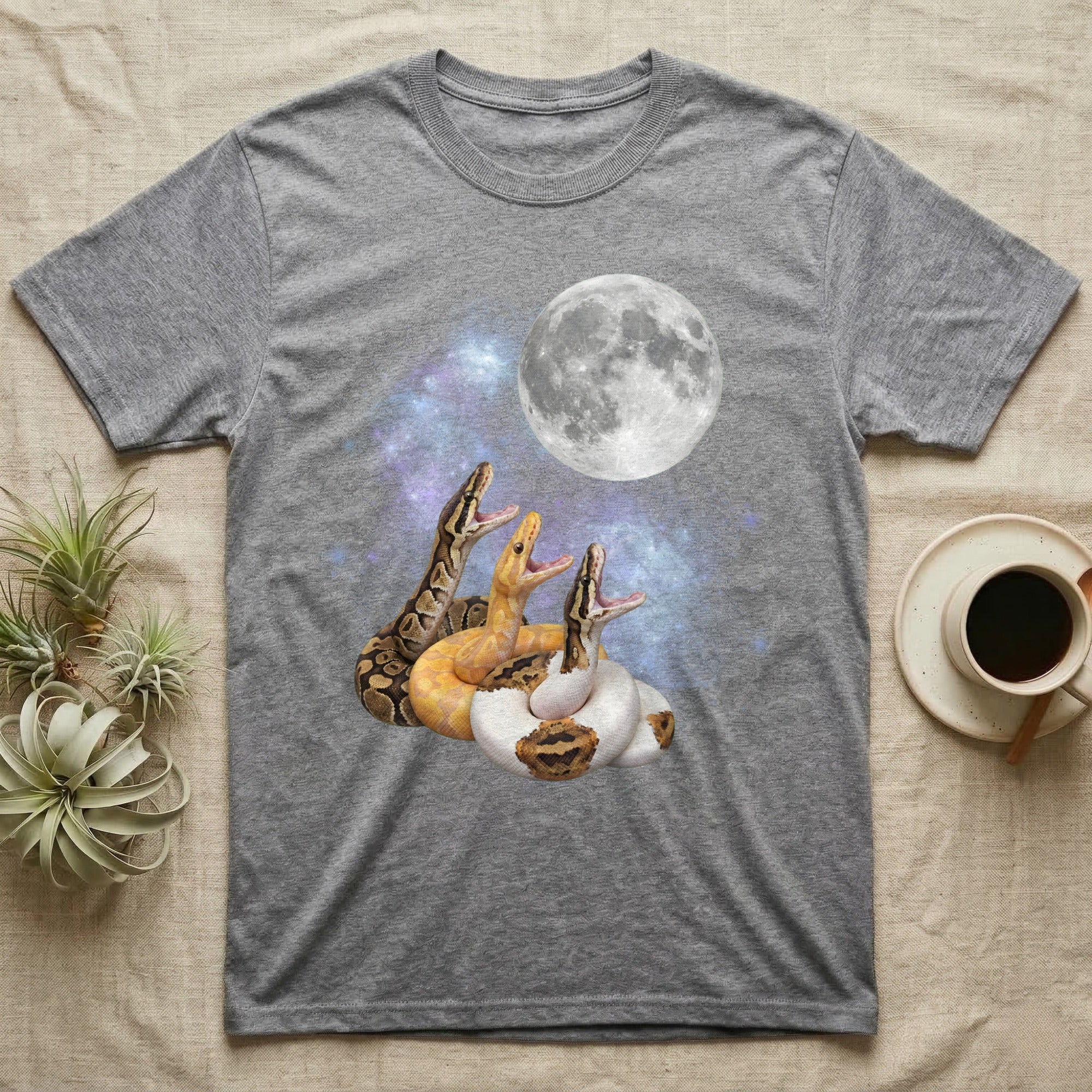 Ball Python Moon Howl T-Shirt in Sport Grey — Three Ball Python colour morphs howling at a full moon over a nebula on a dark grey t-shirt.