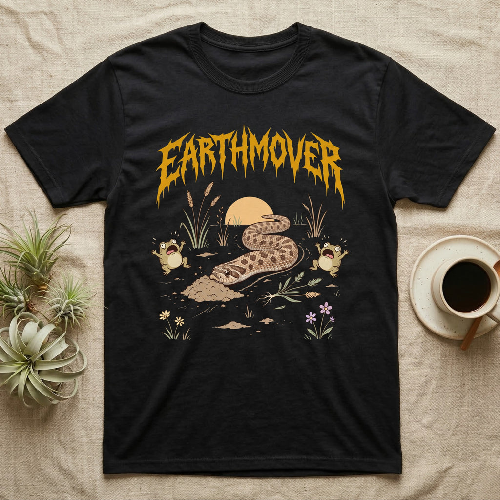 Western Hognose Earthmover T-Shirt in Black — Western hognose snake bulldozing a mound of dirt as two frogs scream, under dripping EARTHMOVER lettering with a low sun and wildflowers.