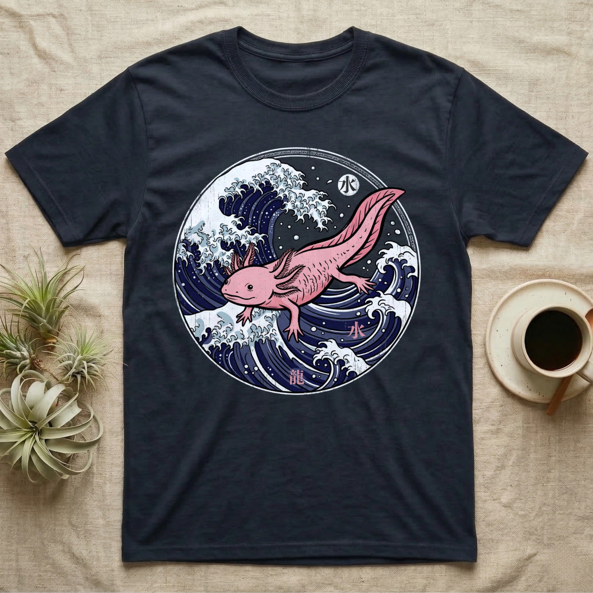Dark t-shirt with pink axolotl in Japanese wave illustration.