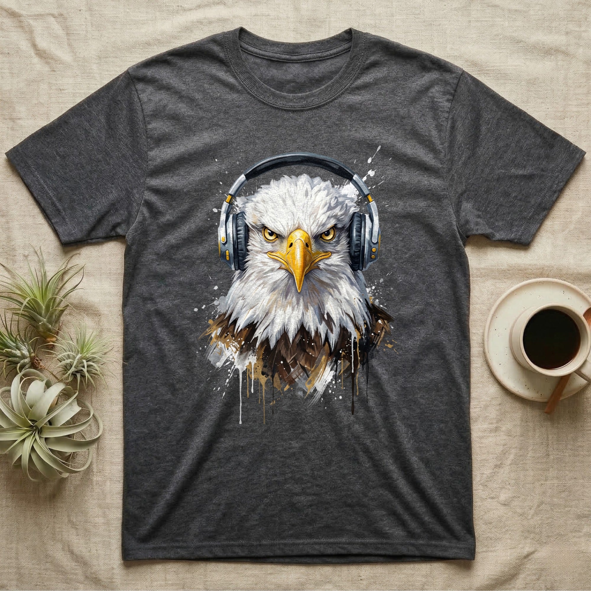 Eagle wearing headphones, graphic art on dark t-shirt.