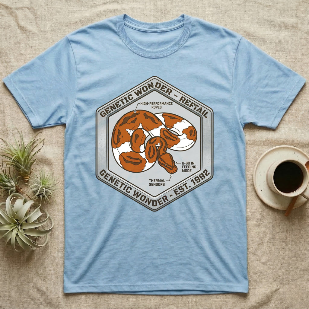 Blue t-shirt with hexagonal graphic of a snake and text about "Genetic Wonder - Reftail".
