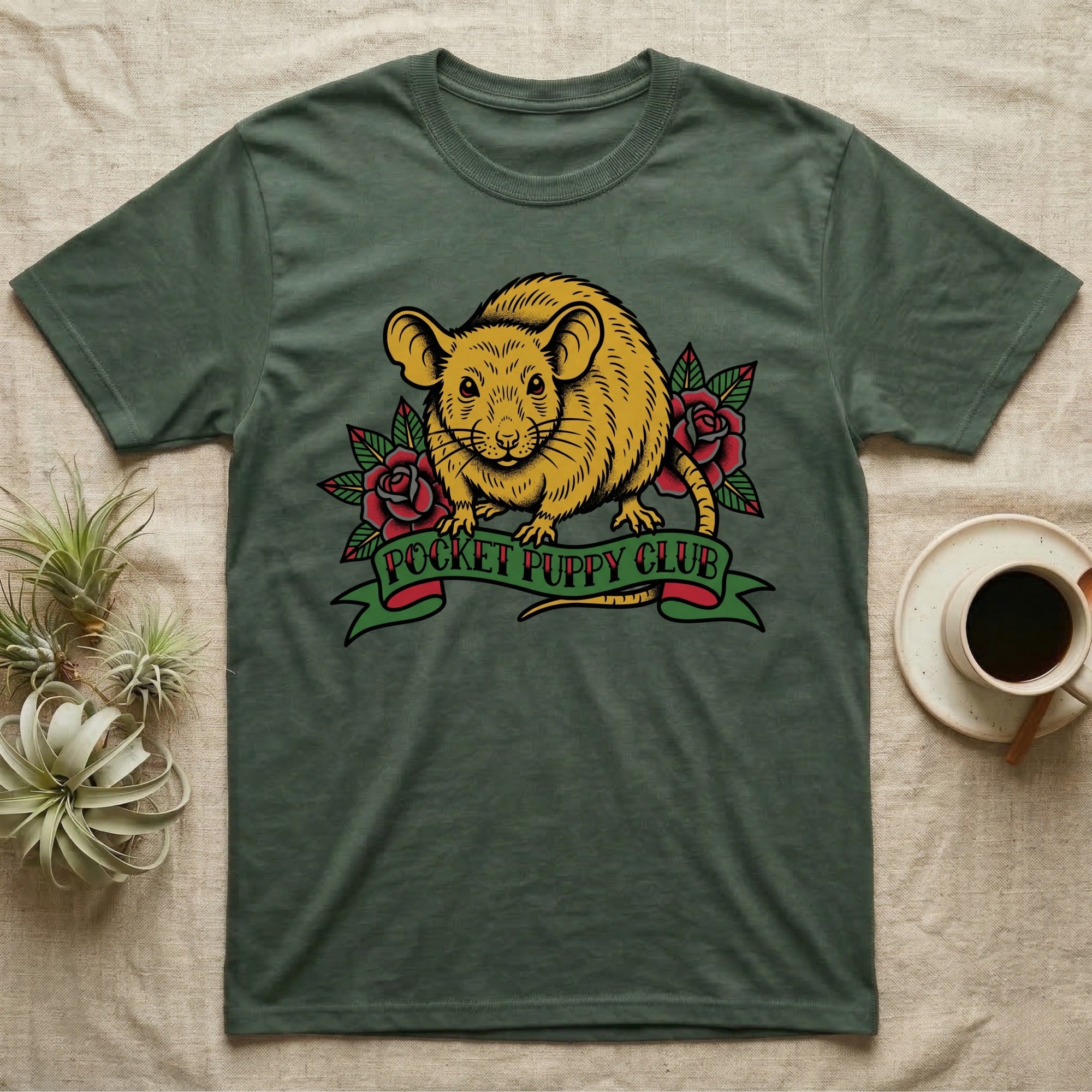 Green t-shirt with a yellow rat illustration and "Pocket Puppy Club" banner.