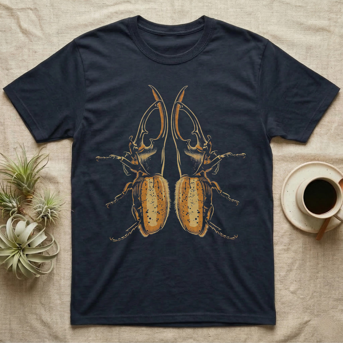 Vintage-engraving illustration of two mirrored Hercules beetles nose to nose with long curved thoracic horns, stippled ochre elytra, graphic-only, no text. — shown on a Navy tee.