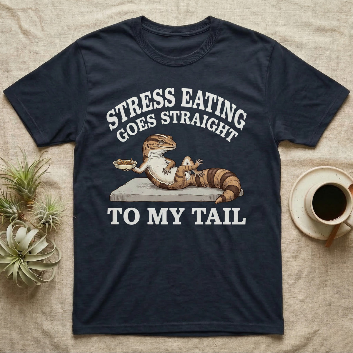 Fat-Tailed Gecko Snacking T-Shirt in Navy — Engraved fat-tailed gecko lounging on a stone with mealworms under Stress Eating Goes Straight To My Tail