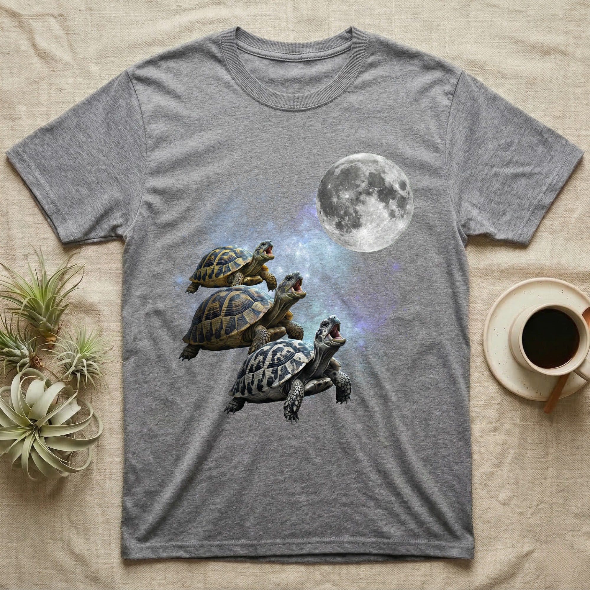 Hermann's Tortoise Moon Howl T-Shirt in Sport Grey — Three Hermann's Tortoise colour morphs howling at a full moon over a nebula on a dark grey t-shirt.