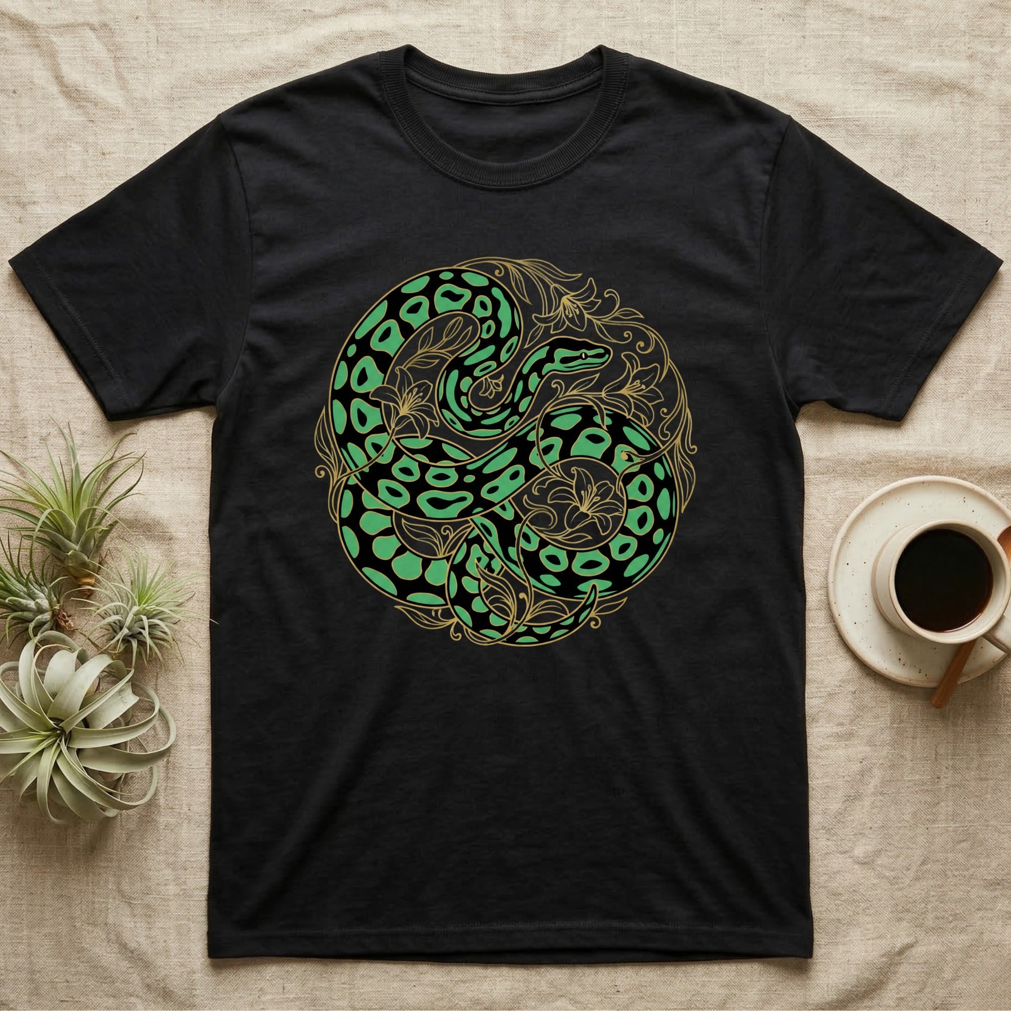 Black t-shirt with a green and gold snake yin-yang design.