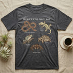 Herpetology 101 Reptile T-Shirt in Dark Heather — Vintage naturalist specimen plate of five terrarium animals arranged as a Herpetology 101 field-guide roster.